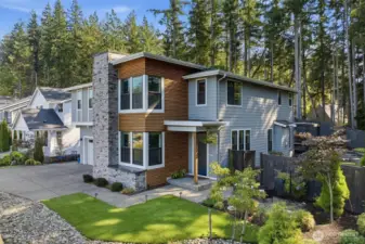 Stunning NW Contemporary inside and out!  Come live your dream home with exceptional grounds including a gated community located close to all amenities.