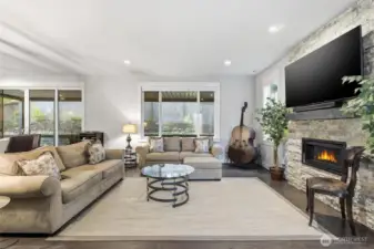 Living space is light and bright with high ceilings, modern elements and wide windows.