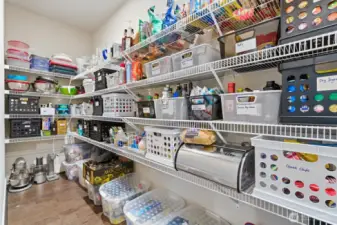 Large walk-in pantry is ideal for your food storage needs.
