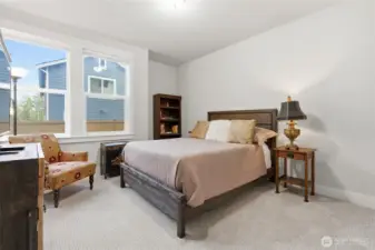 Main floor bedroom near entry is ideal for a work from home office or guests.