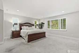 This generously-sized primary bedroom on second level is ready for your personal touches.