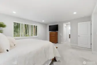 Primary bedroom with attached 5 piece bathroom and 2 walk-in closets.