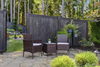 Beautiful custom landscaping and a fully fenced yard.