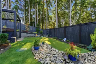 Turf lawn for easy maintenance and the place for you to enjoy a few holes after work.