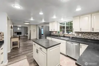 Updated kitchen with stainless steal appliances and a gas stove. 13911 113th Ave Ct E, Puyallup, WA 98374