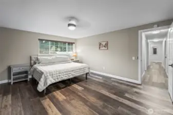 Spacious primary bedroom with walk-in closet and primary bathroom. 13911 113th Ave Ct E, Puyallup, WA 98374