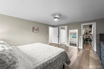 Spacious primary bedroom with walk-in closet and primary bathroom. 13911 113th Ave Ct E, Puyallup, WA 98374