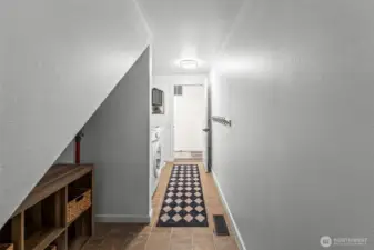 Large laundry room with plenty of storage space. 13911 113th Ave Ct E, Puyallup, WA 98374