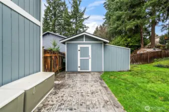 Plenty of outdoor storage in the back yard shed. 13911 113th Ave Ct E, Puyallup, WA 98374