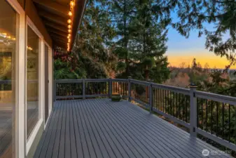 Spacious deck with gorgeous sunset and mountain views.