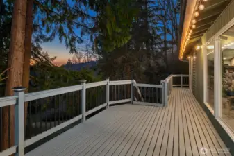 Spacious deck with gorgeous sunset and mountain views.