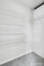 Primary walk-in closet.