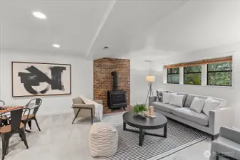 A large lower-level entertainment room perfect for movie nights, gatherings, or game days.