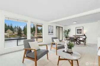 Open great room - awesome lake views, new carpet, paint, and lighting!