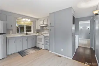 Another look from kitchen - Washer & Dryer in hallway toward primary bedroom.