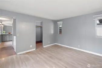 Spacious primary bedroom with plenty of room for comfort.