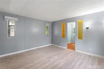 Primary bedroom with a generous ensuite bathroom and walk-in closet offering plenty of storage.