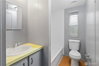 Full bathroom conveniently located near the second bedroom.