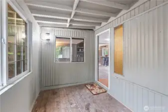 Enclosed porch providing extra living space and flexibility.