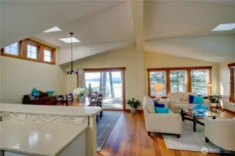 Open concept living. View from kitchen looking into Dining room and Living room. The view will leave you awe struck, when seen in person.