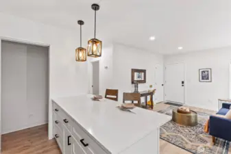 The tankless water heater is in the pantry closet to the left - along with TONS of open shelving for pantry storage.