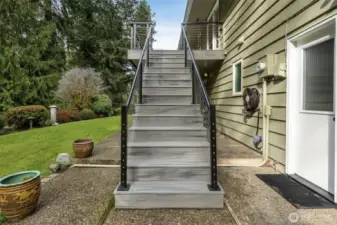 Stairs connecting the garden level to the deck.