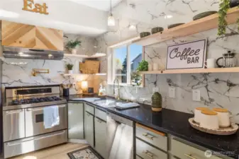 Custom wood working on range hood and ends of island bring character and tasteful elegance!