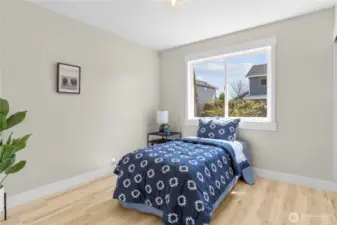 One of two additional bedrooms that is generous in size!