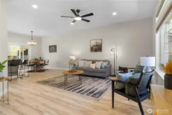 Large living room with open concept to kitchen flows lovely!