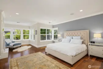 Primary suite overlooks level gardens