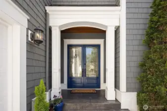Double door entry to formal and informal spaces