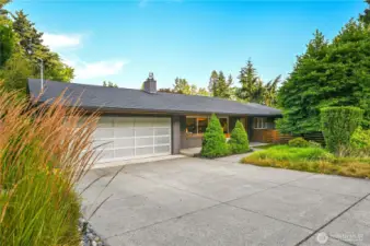 Beautifully updated one-level luxury home on a privately situated corner lot.