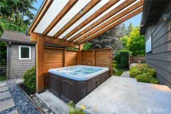 A covered patio for late night or year-round soak in the hot tub just steps from your primary suite!
