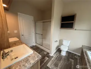 5 piece Primary Bathroom with dual vanity, soaking tub and separate shower
