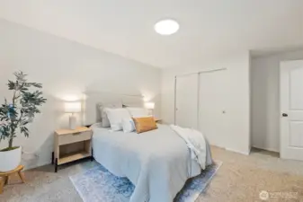 Primary bedroom with 1/2 bath connected.