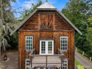 Cedar siding adds visual interest and a nod to its previous iteration as a barn.