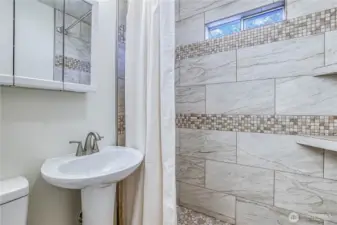 Bath with custom tile shower