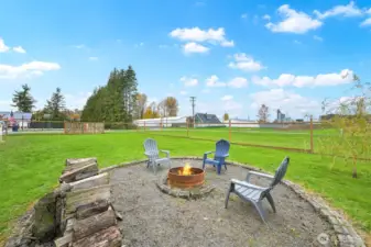 Imagine relaxing in your firebit area with a huge fenced yard.
