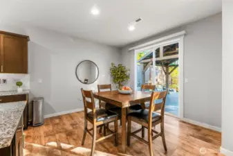 Large dinning space off kitchen, with access to the fully fenced backyard.