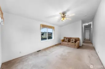 Living Room view towards the Hallway leading to the Bedrooms.