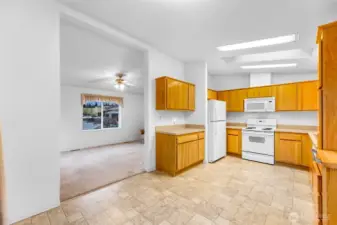 View from Dining Room to the Kitchen and the Living Room.
