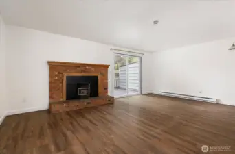 Large great room with toasty warm pellet stove for cozy nights.