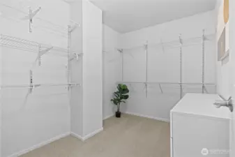Large primary walk-in closet.