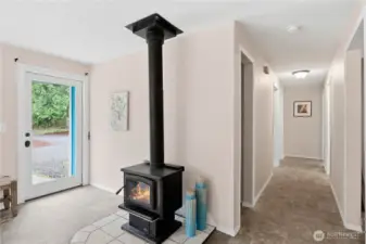 Wood burning stove for efficient heat