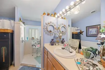 Primary bathroom has 2 showers. One standard and the other is a large step in.