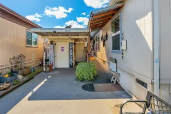 There are 2 large storage sheds in the carport.