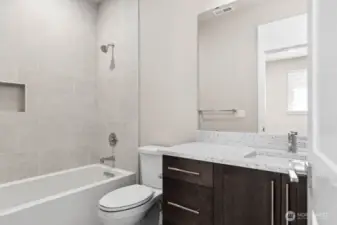 Attached 3/4 bath in second bedroom.