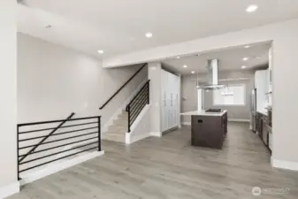 Hardwoods throughout out the main floor and modern metal railings
