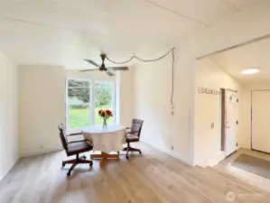 Dining area of the kitchen overlooking front field.
