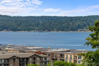 Views of Commencement Bay and Vashon Island from the primary bedroom.